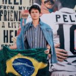 Imagem do post No Brasil: Ansel Elgort ouve e canta “Paradinha” da Anitta e diz que parece com Shakira