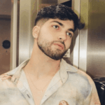 Imagem do post Conheça Mark Soutino, influenciador popular no TikTok que dá dicas de looks com peças de brechó 